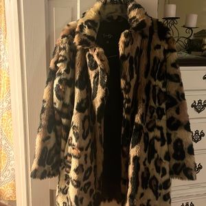 This is a Jessica Simpson Faux Coat! Beautiful Coat, super warm and cozy!